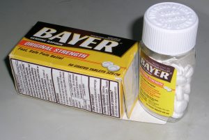a yellow box with black text and white label